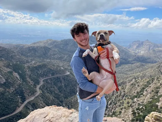 Bryson Mineart with his dog Remus