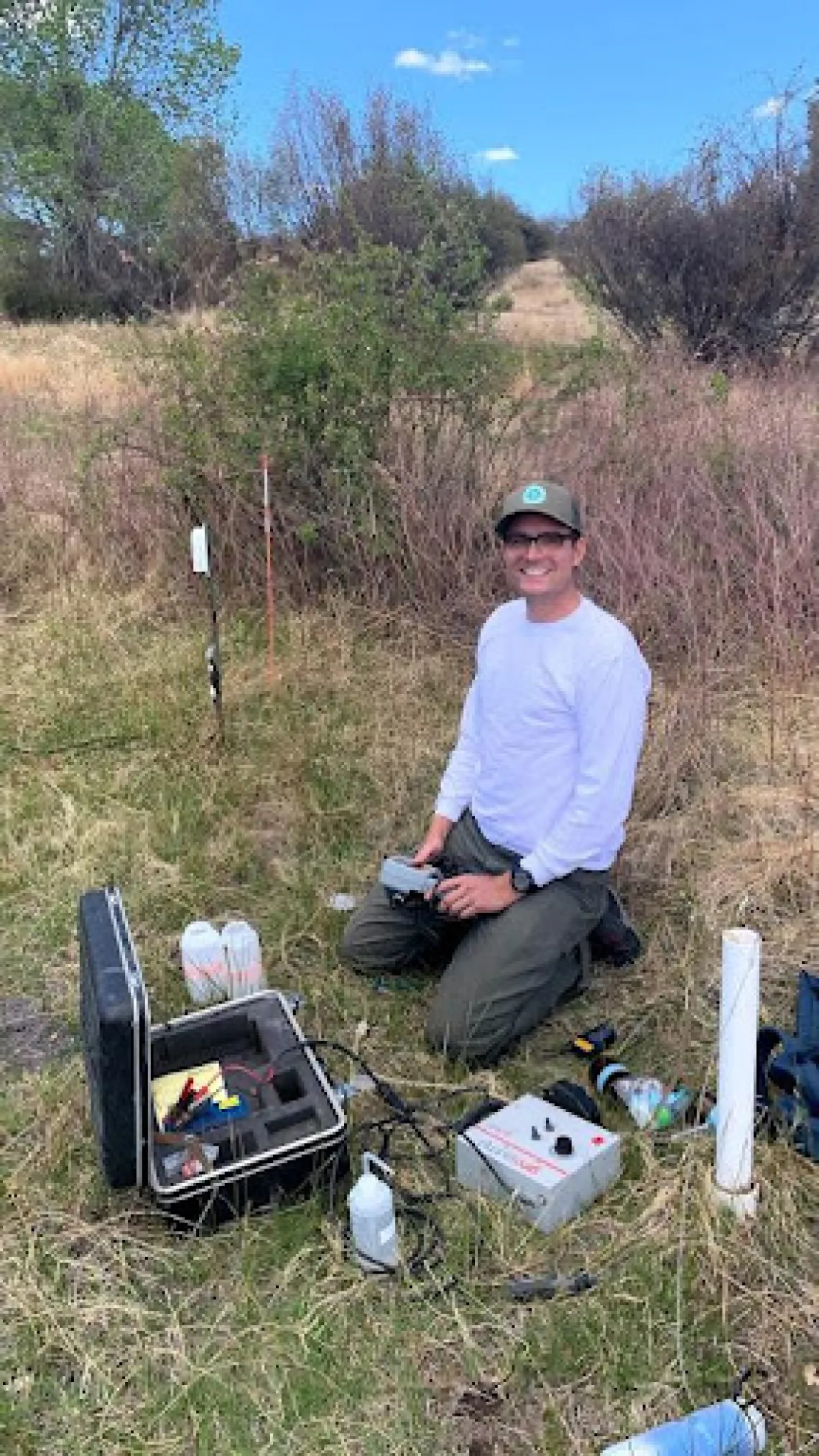 Adam Stratman doing field work.