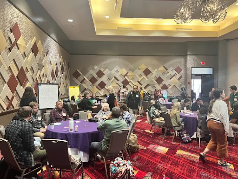 A room of people at the SWAF 2024 conference