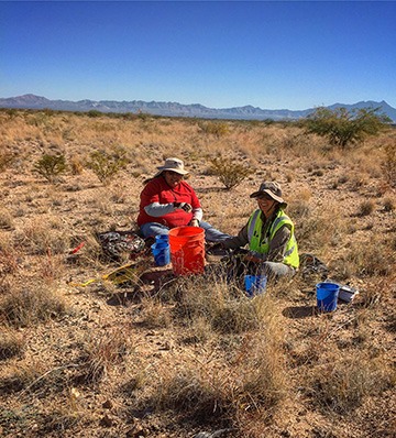 Jennings in the field with tribal liaison in southern Arizona.